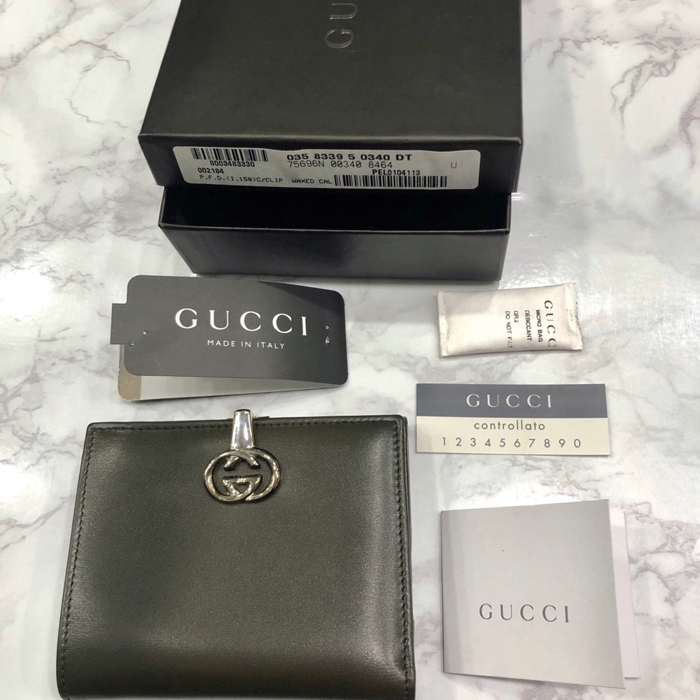 Gucci compact dark green wallet
